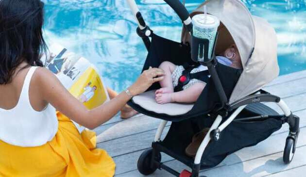 Mother pushing baby in Babyzen buggy