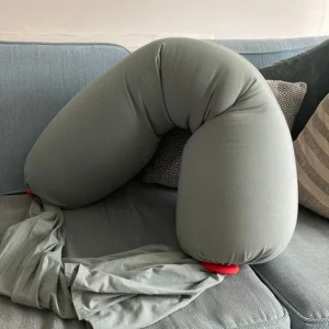 review image of the bbhugme pregnancy pillow on tester's sofa