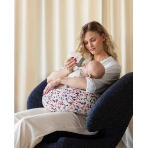 bbhugme Adjustable Nursing Pillow stock image of mother bottle feeding baby