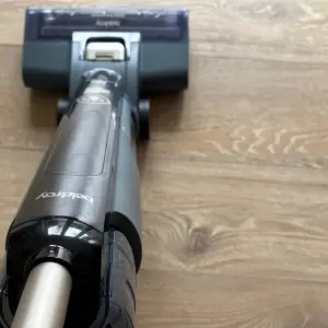 Holding the Beldray All-in-One Multi-Surface Floor Cleaner