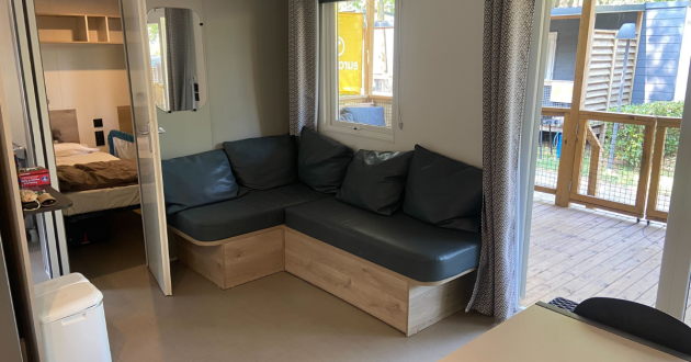 A sofa in a three-bedroom Premium holiday home at Eurocamp Bella Italia