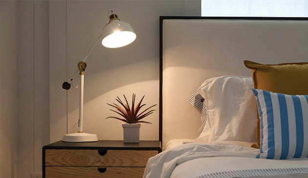 Lamp on bedside table