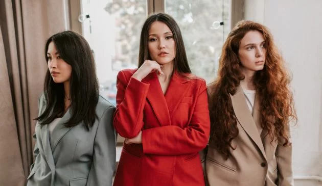 Group of women wearing blazers