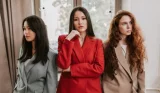 Group of women wearing blazers