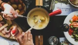 Melted cheese in a fondue set