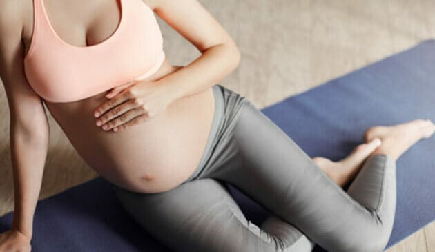 pregnant woman in sportswear