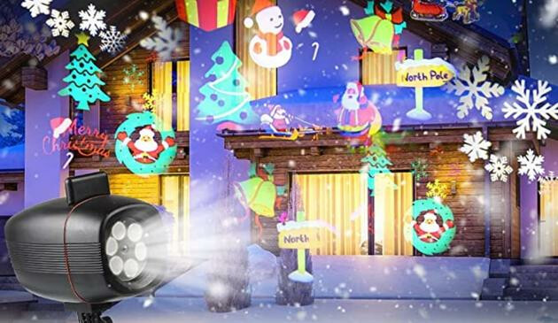 House lit up with Christmas projector images