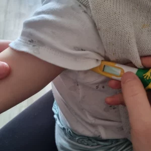 Toddler having temperature taken with the Beurer BY11 thermometer