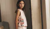 A child wears Boden clothing