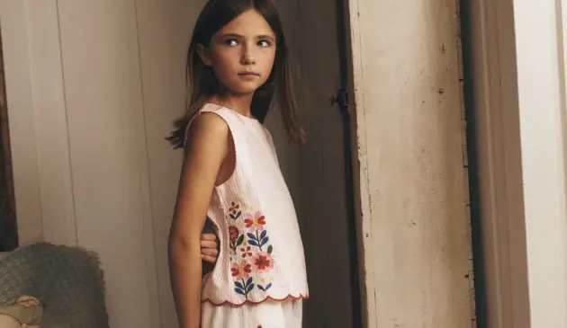 A child wears Boden clothing
