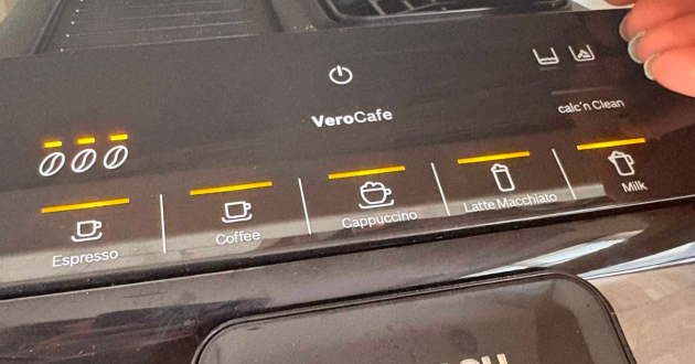 Close-up of the Bosch VeroCafe touch controls for espresso, coffee, cappuccino, latte macchiato and milk, with strength and cleaning indicators