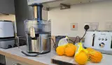 The Braun MultiJuice 7 spin juicer shown next to oranges during testing