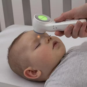 Braun Sensian 7 Forehead Thermometer being used on baby