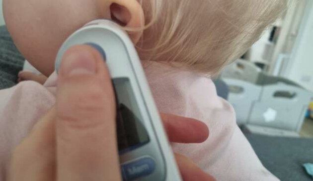 Braun ThermoScan 7 thermometer in baby's ear