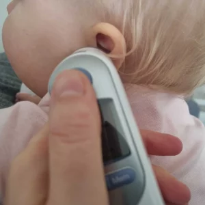 Braun ThermoScan 7 baby thermometer in baby's ear