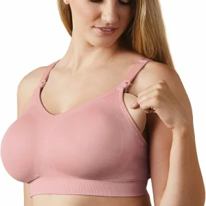 Bravado! Body Silk Seamless Nursing Bra stock image of woman removing breast pad