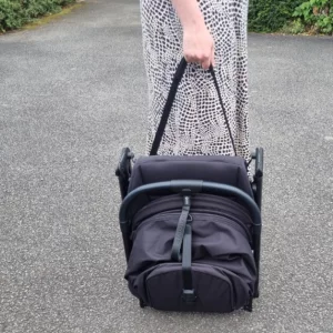 Mum holding bugaboo butterfly folded
