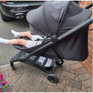 child lying flat in Bugaboo Butterfly 2 stroller
