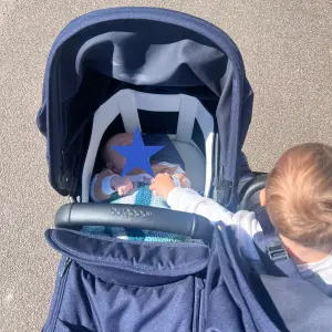 Two children in Bugaboo Donkey 6 double buggy