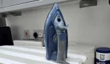 A view of the Bush ES2475 Steam Iron review with its water lid open