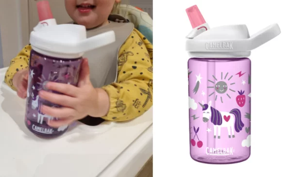 Toddler holding Camelbak Eddy+ kids' bottle
