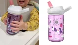 Toddler holding Camelbak Eddy+ kids' bottle