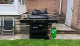 Char-Broil Versa-Tile in a garden