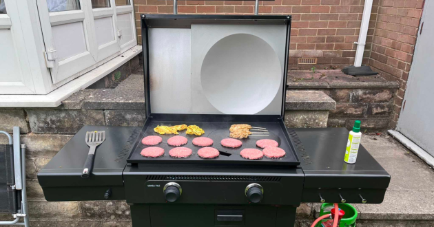 Burgers being cooked during the Char-Broil Versa-Tile