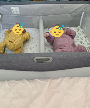 Chicco Next2Me Twins Crib review image featuring crib in testing with real babies