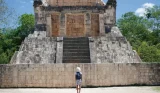 A child exploring Chichen Itza in Mexico
