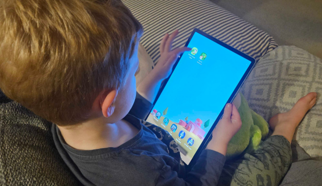 child playing with Samsung Galaxy Tab S10+