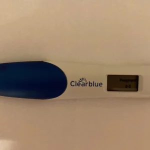Clearblue Weeks Indicator pregnancy test in use showing positive result