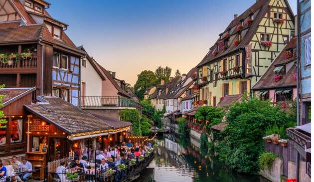 Canal in Colmar with typical, colourful buildings