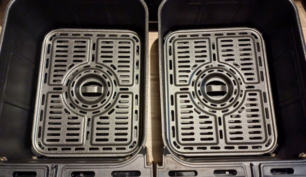 Inside the Cosori Dual Air Fryer baskets