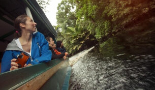 A family on a boat in Costa Rica