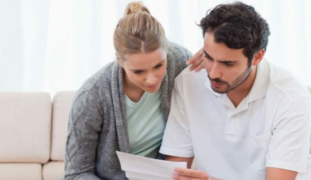 Couple Reading Letter