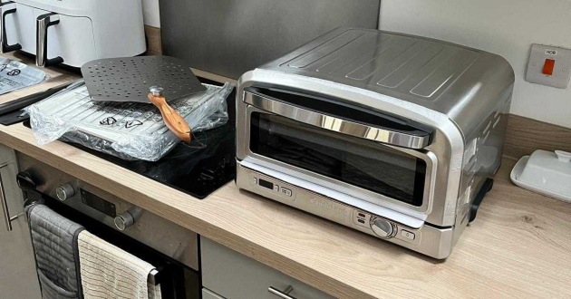 A view of the Cuisinart Pizza Oven atop a kitchen worktop
