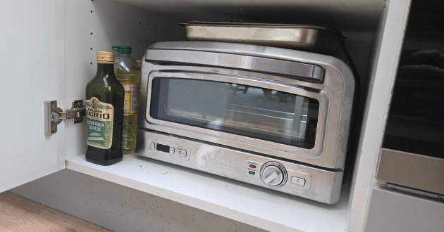 A view of the Cuisinart Pizza Oven inside a cupboard