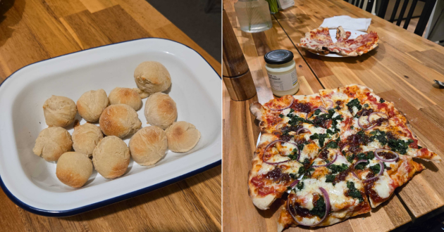 Dough balls and homemade pizzas on a table