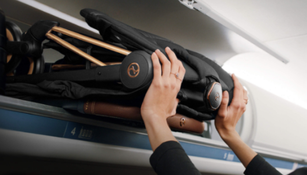 Cybex Coya in overhead compartment on plane