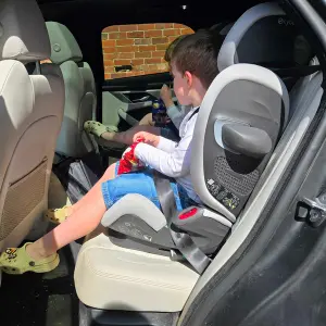 Cybex Pallas G3 with child in the seat