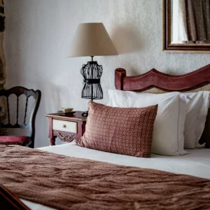 A view of the bed in a bedroom at Country Kids in the South of France