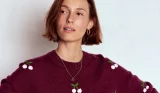 Model wears Boden's cherry and maroon jumper