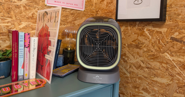 Dreamland eco fan heater on office sideboard