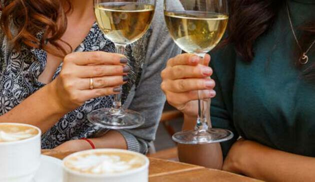 Drinking wine and coffee