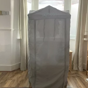 Journalist Rachel Erdos hand testing the Dry:Soon three-tiered heated airer cover