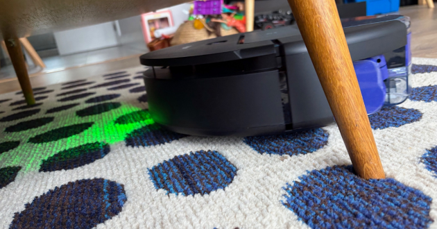 Dyson Spot + Scrub AI robot vacuum cleaner cleaning carpets