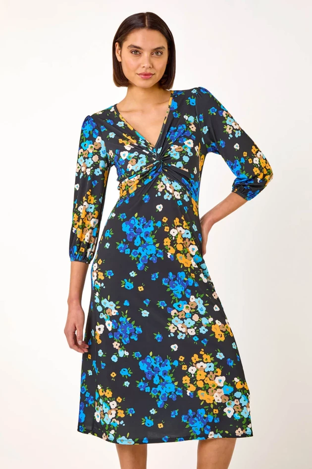 A model wears Roman's Blue Twist Detail Floral Midi Dress