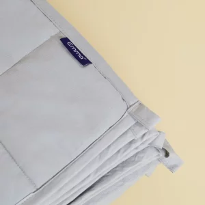 A close up of the material of the Emma Hug Weighted Blanket