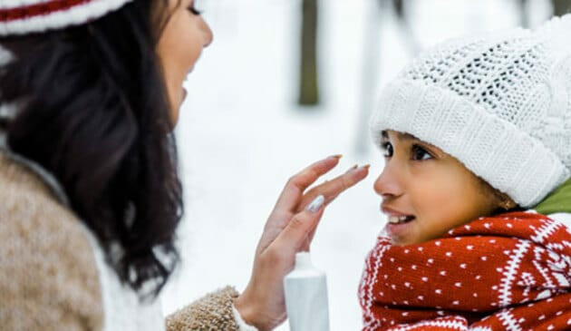 Mother and child in winter